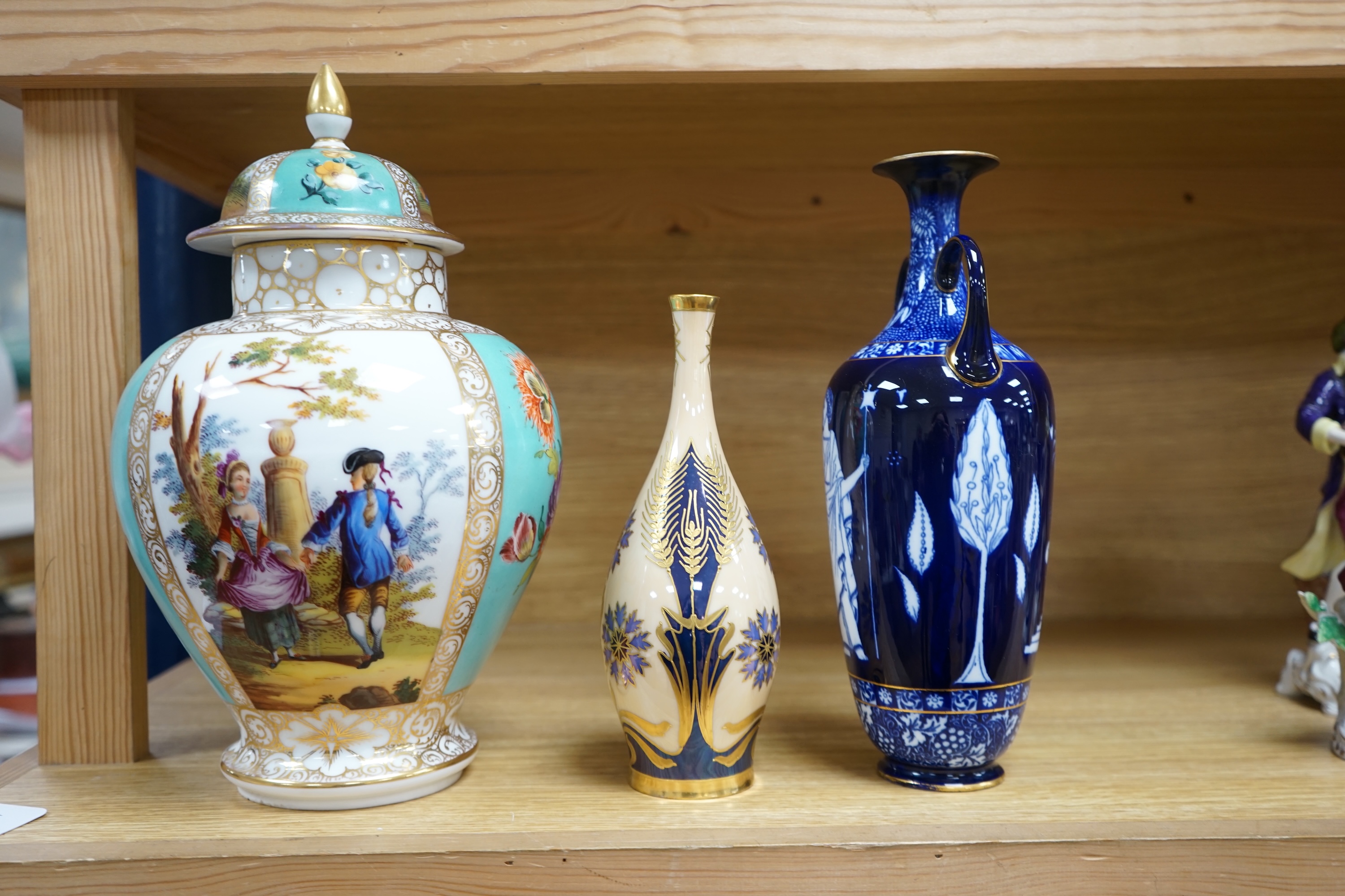 A Dresden porcelain jar and cover, 32cm high, a Doulton Burslem Grecian revival vase and and a Continental Art Nouveau bottle vase (3) condition - Dresden and Doulton restored necks otherwise visible condition